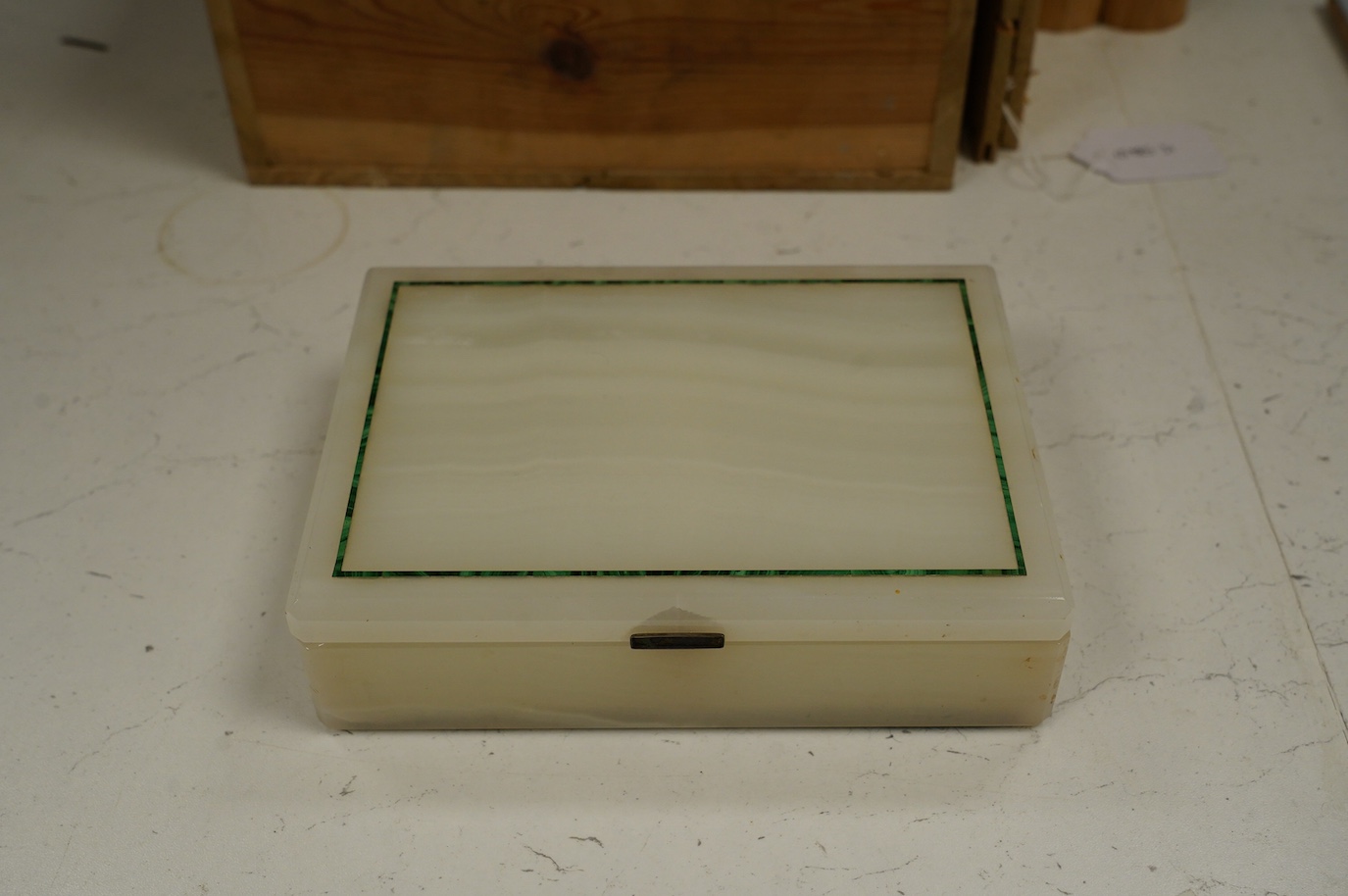 An Art Deco white onyx and malachite-banded box, with silver-gilt hinge hallmarked for London 1938, 19 x 14 x 5cm. Condition - poor to fair